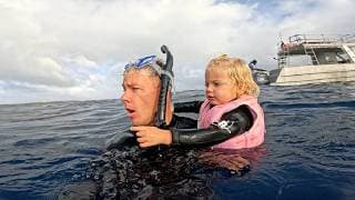 2 Year Old Swims With Humpback Whales in Tonga