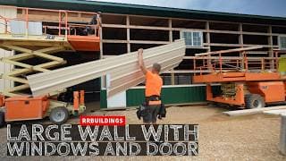 Large Wall Install With Windows And Doors on The Biggest Building