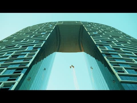 World’s First Wingsuit Flight Through The Iconic Address Beach Resort In Dubai