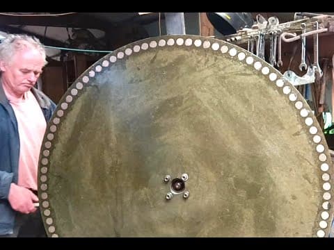 Absolutely Huge Magnetic Induction Heater! Using 100 Spinning Neodynium Magnets And A Bucket
