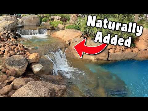 Building A Waterfall Near A Natural Lake In Africa