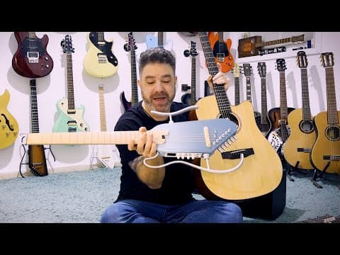 How Does The Hush-i Pro Travel Guitar Compare To A Regular Donner Dag-1c Acoustic Guitar?